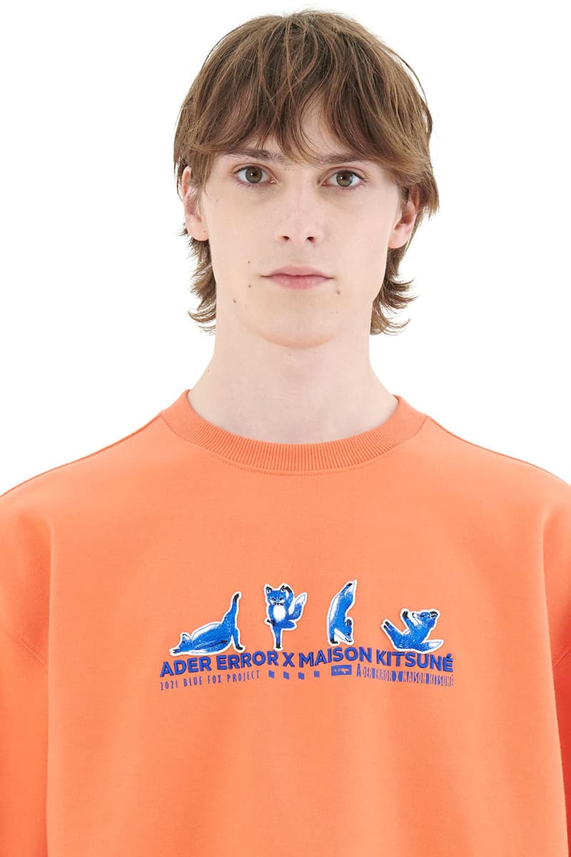 ader error maison kitsune blue fox lazy stretching yawning t shirts sweatshirts hoodies cap collaboration collection logo misplaced tag detailing paris tokyo korea