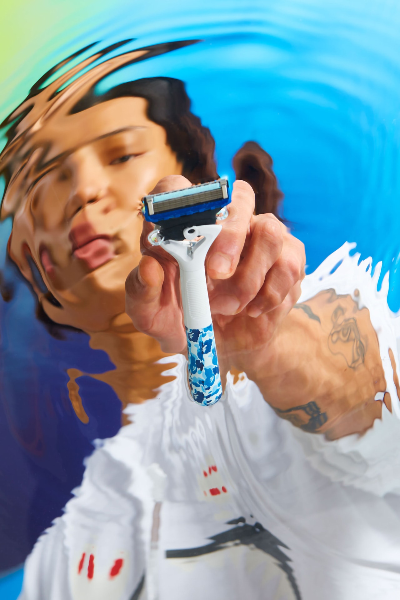 BAPE Gillette blue camo razor collaboration lookbook revamped camo print razor accompanying BAPE designed magnetic razor stand and travel case Ape Head icon