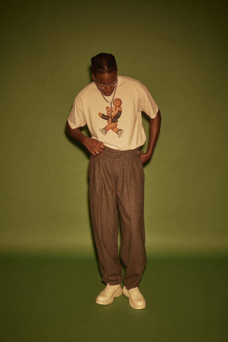DOMREBEL art studio Montréal, Canada DIY aesthetic with high quality fabrics and savoir-faire cartoon characters high quality screen-prints, embroideries and paintings on range of boxy tees, heavyweight sweats, trackpants and denim french terry cotton custom hand-set Swarovski crystals or distressed holes second launch january 2022