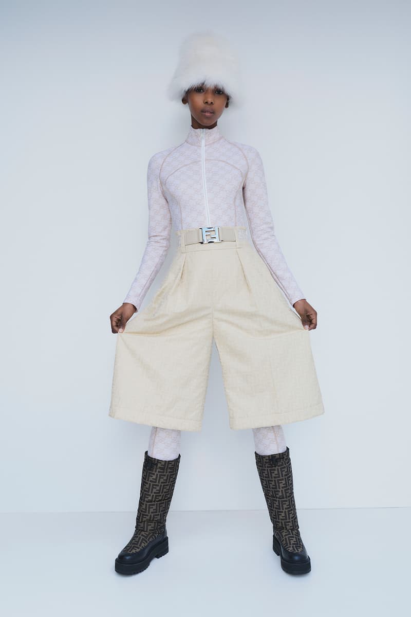 Fendi Releases Its 2021 Skiwear Line women men outwear accessories ski trip sustainability regenerated duck feathers aquafil econyl yarn jacket tracksuits karligraphy monogram FF logo down pants weatherproof heat tech skis helmet goggles boots release info 