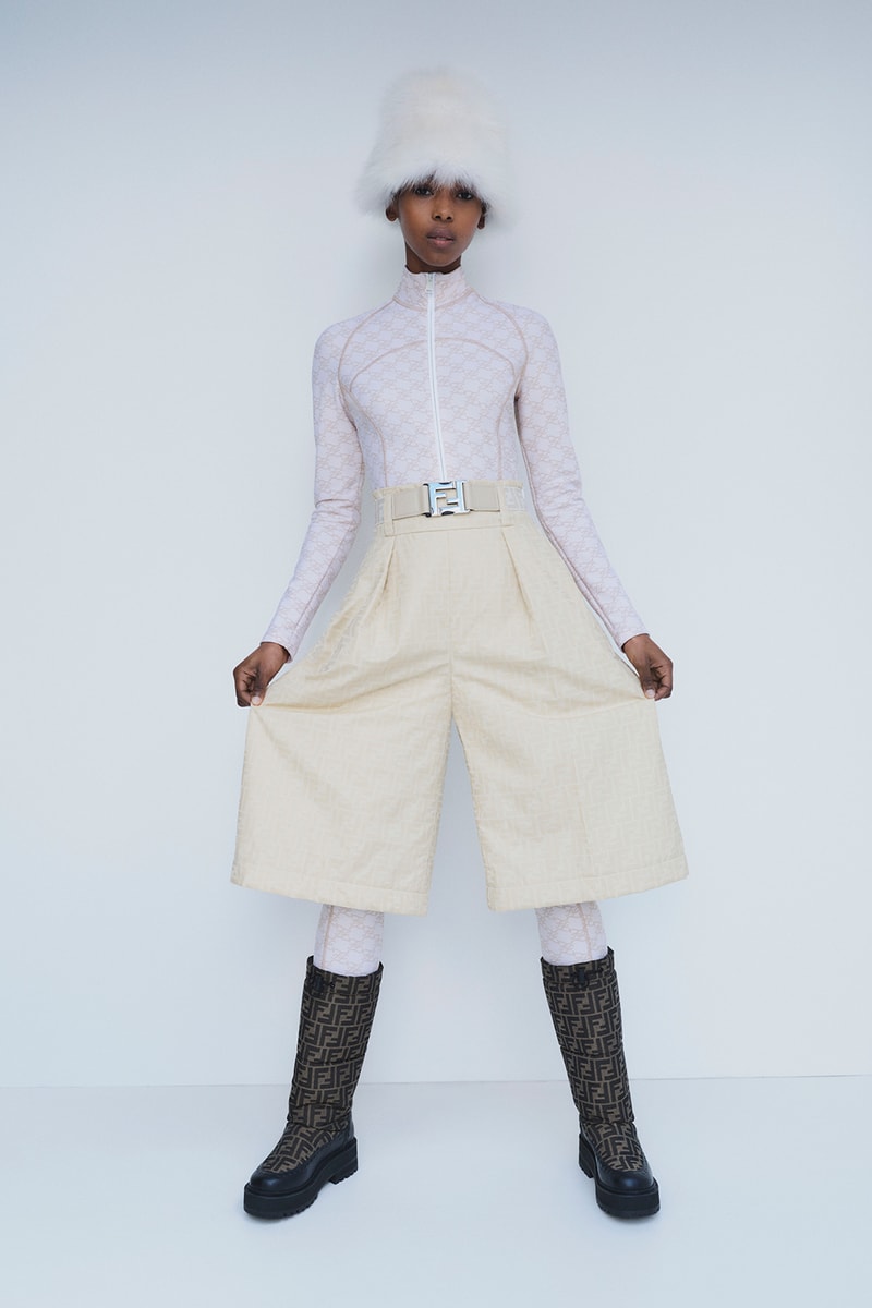 Fendi Releases Its 2021 Skiwear Line women men outwear accessories ski trip sustainability regenerated duck feathers aquafil econyl yarn jacket tracksuits karligraphy monogram FF logo down pants weatherproof heat tech skis helmet goggles boots release info 
