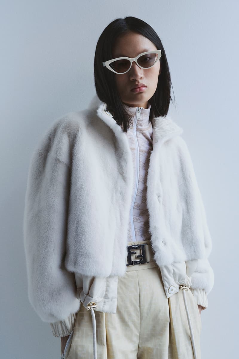 Fendi Releases Its 2021 Skiwear Line women men outwear accessories ski trip sustainability regenerated duck feathers aquafil econyl yarn jacket tracksuits karligraphy monogram FF logo down pants weatherproof heat tech skis helmet goggles boots release info 
