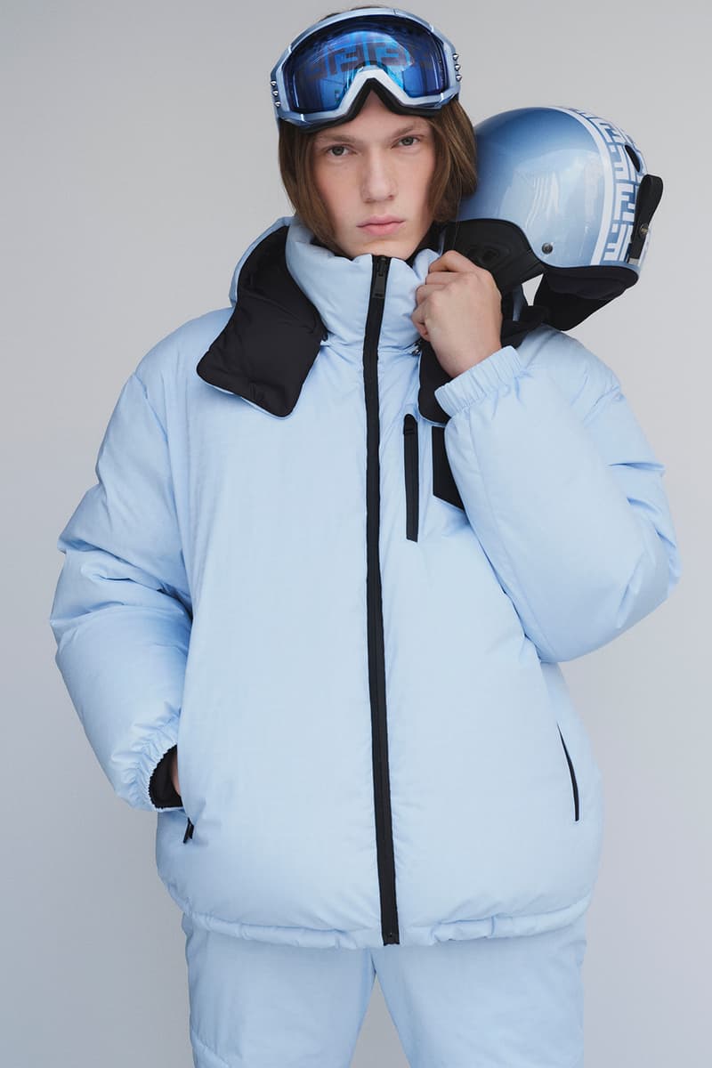 Fendi Releases Its 2021 Skiwear Line women men outwear accessories ski trip sustainability regenerated duck feathers aquafil econyl yarn jacket tracksuits karligraphy monogram FF logo down pants weatherproof heat tech skis helmet goggles boots release info 