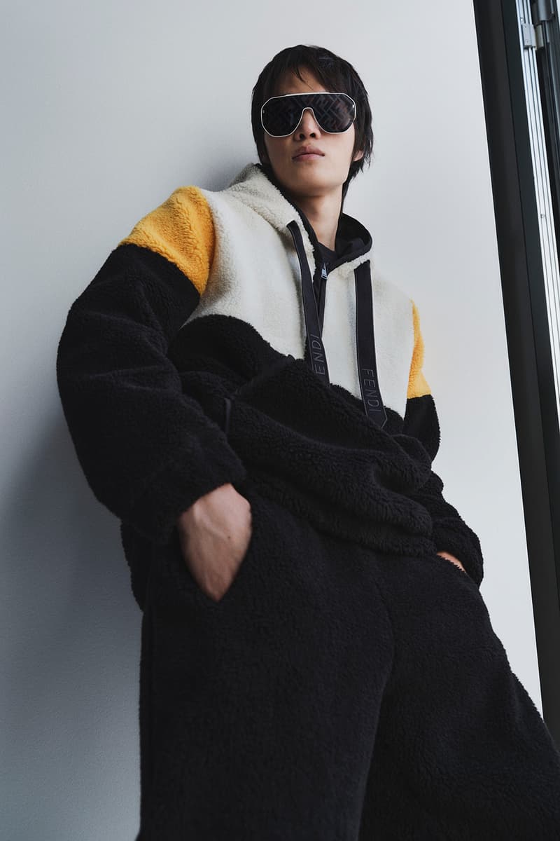 Fendi Releases Its 2021 Skiwear Line women men outwear accessories ski trip sustainability regenerated duck feathers aquafil econyl yarn jacket tracksuits karligraphy monogram FF logo down pants weatherproof heat tech skis helmet goggles boots release info 