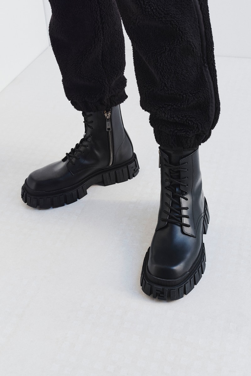 Fendi Releases Its 2021 Skiwear Line women men outwear accessories ski trip sustainability regenerated duck feathers aquafil econyl yarn jacket tracksuits karligraphy monogram FF logo down pants weatherproof heat tech skis helmet goggles boots release info 
