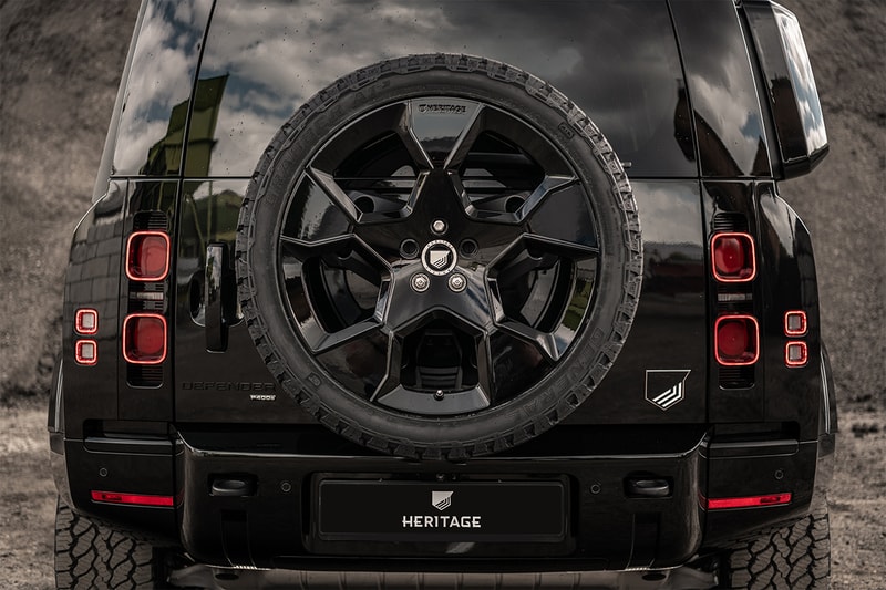 heritage customs workshop garage valiance tuxedo black exterior interior land rover defender off roading 