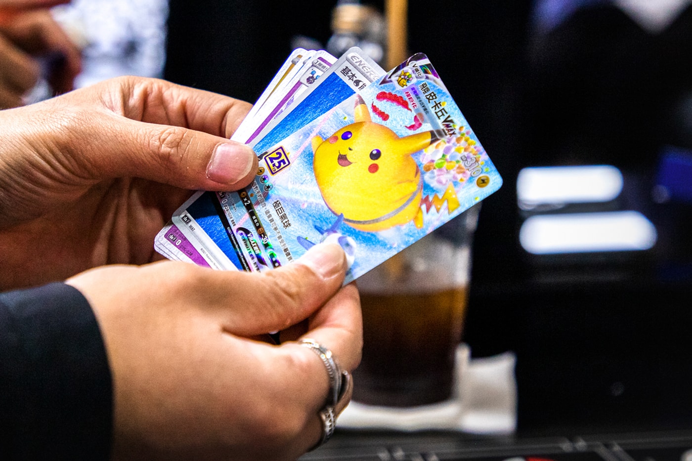Vinath Oudomsine Buys $57,000 usd Pokemon card COVID pandemic relief loan