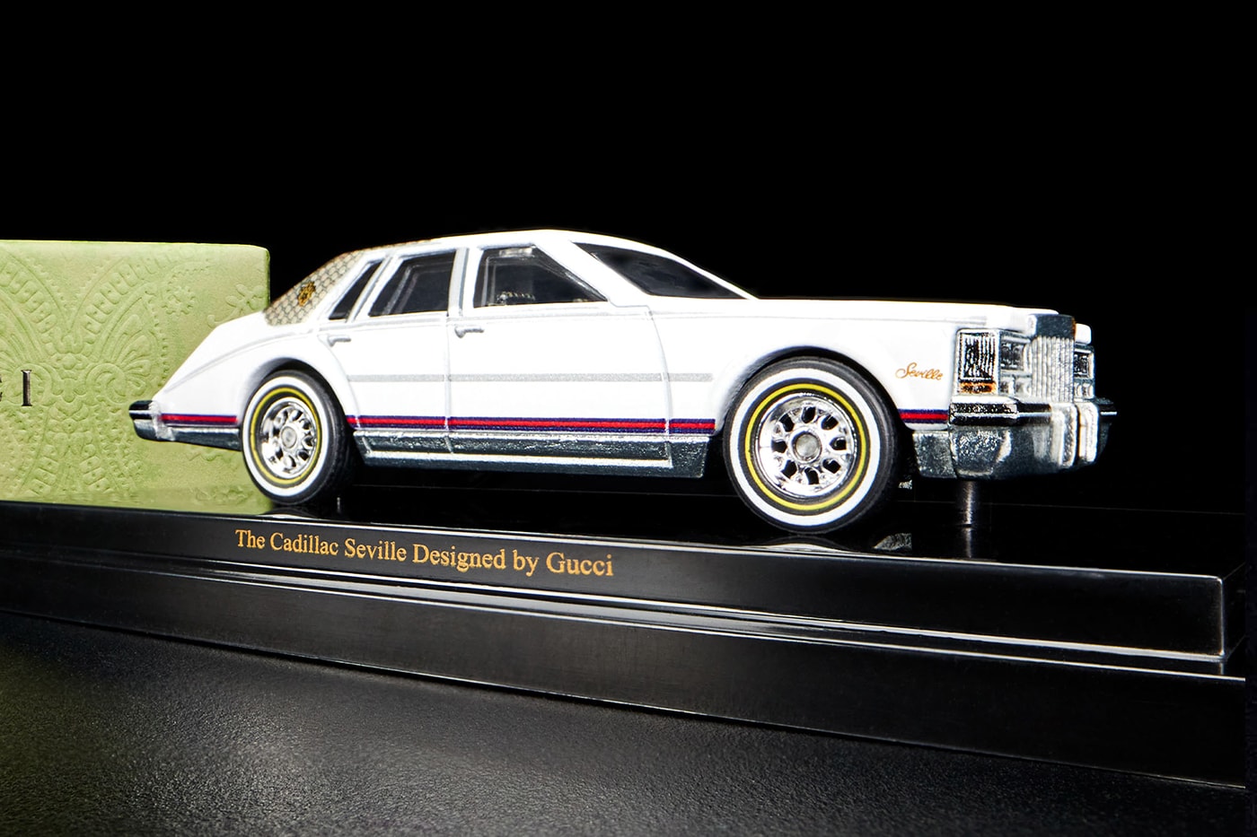 Mattel Creations Inc Hot wheels collectible gucci 100th anniversary limited edition cadillac seville october 18 Italian detroit vinyl top gold radwood custom car 1:6 display case  release info