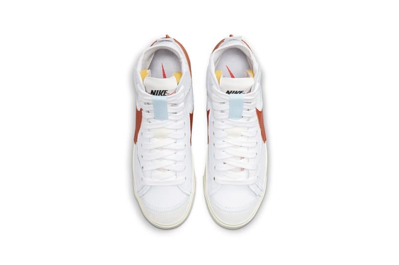 white nike blazer black swoosh