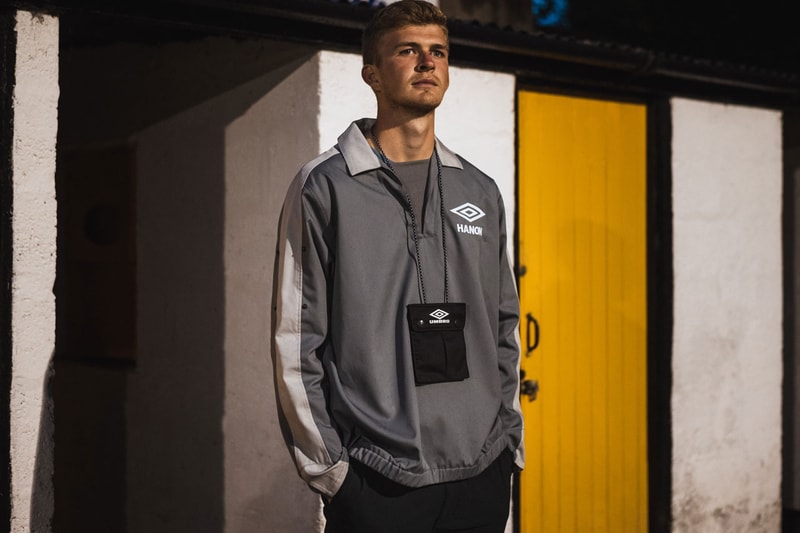HANON and UMBRO Reunite for a Workwear-Inspired Drill Top Fashion