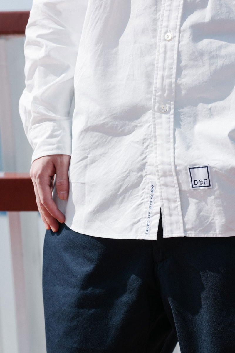 japanese brand nanamica team up DOE shanghai co-branded series offline store house of seven seas gathering the same lovers square logo seven reversible down cardigan button down wind shirt wide chino pants offline stores release info