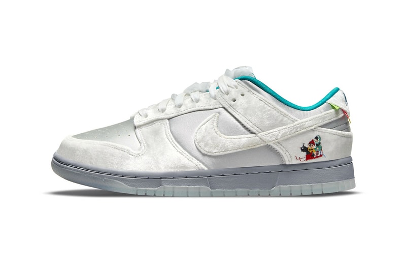 First Look at the Nike Dunk Low "Ice" Holiday Season Harbin international sculpture festival silver satin white velvet turqoise pennon banners children sled SNKRS release info