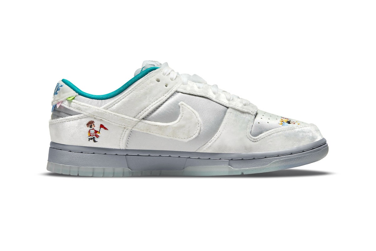 First Look at the Nike Dunk Low "Ice" Holiday Season Harbin international sculpture festival silver satin white velvet turqoise pennon banners children sled SNKRS release info