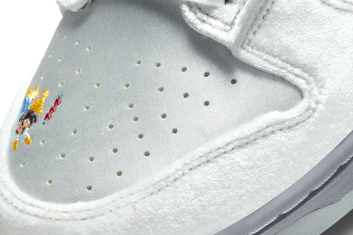 First Look at the Nike Dunk Low "Ice" Holiday Season Harbin international sculpture festival silver satin white velvet turqoise pennon banners children sled SNKRS release info