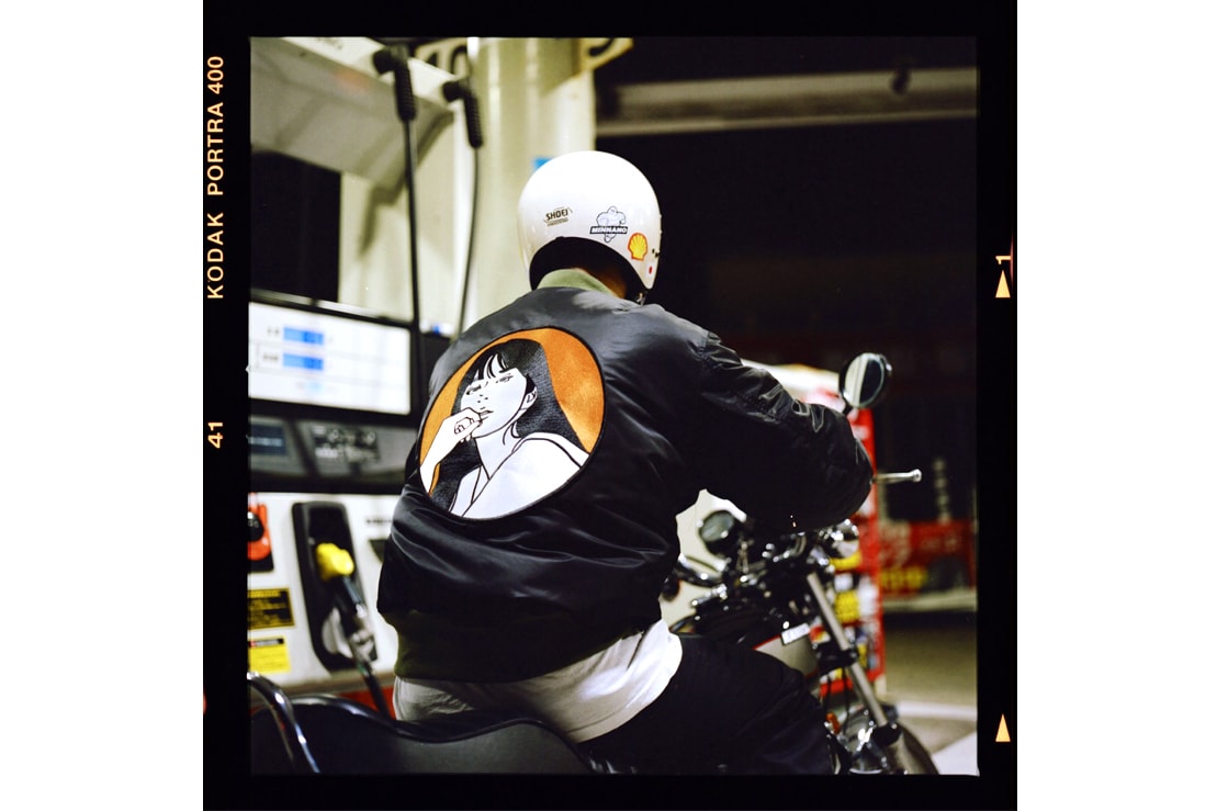 в эфире Alpha Industries Куртка-бомбер MA-1 черно-оранжевая булавки в кармане для сигар Нончели Кайн произведение искусства совместная коллекция информация о выпуске