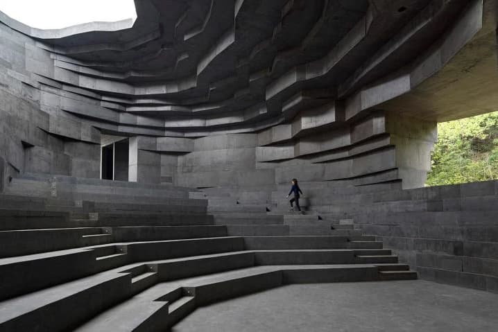 Open Architecture Completes "The Chapel of Sound" Rock-Like Concert Hall mountainous valley great wall of china concrete natural local stone reflection amphitheater stage beijing Li Hu Huang wenjiang news