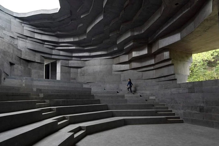 Open Architecture Completes "The Chapel of Sound" Rock-Like Concert Hall mountainous valley great wall of china concrete natural local stone reflection amphitheater stage beijing Li Hu Huang wenjiang news
