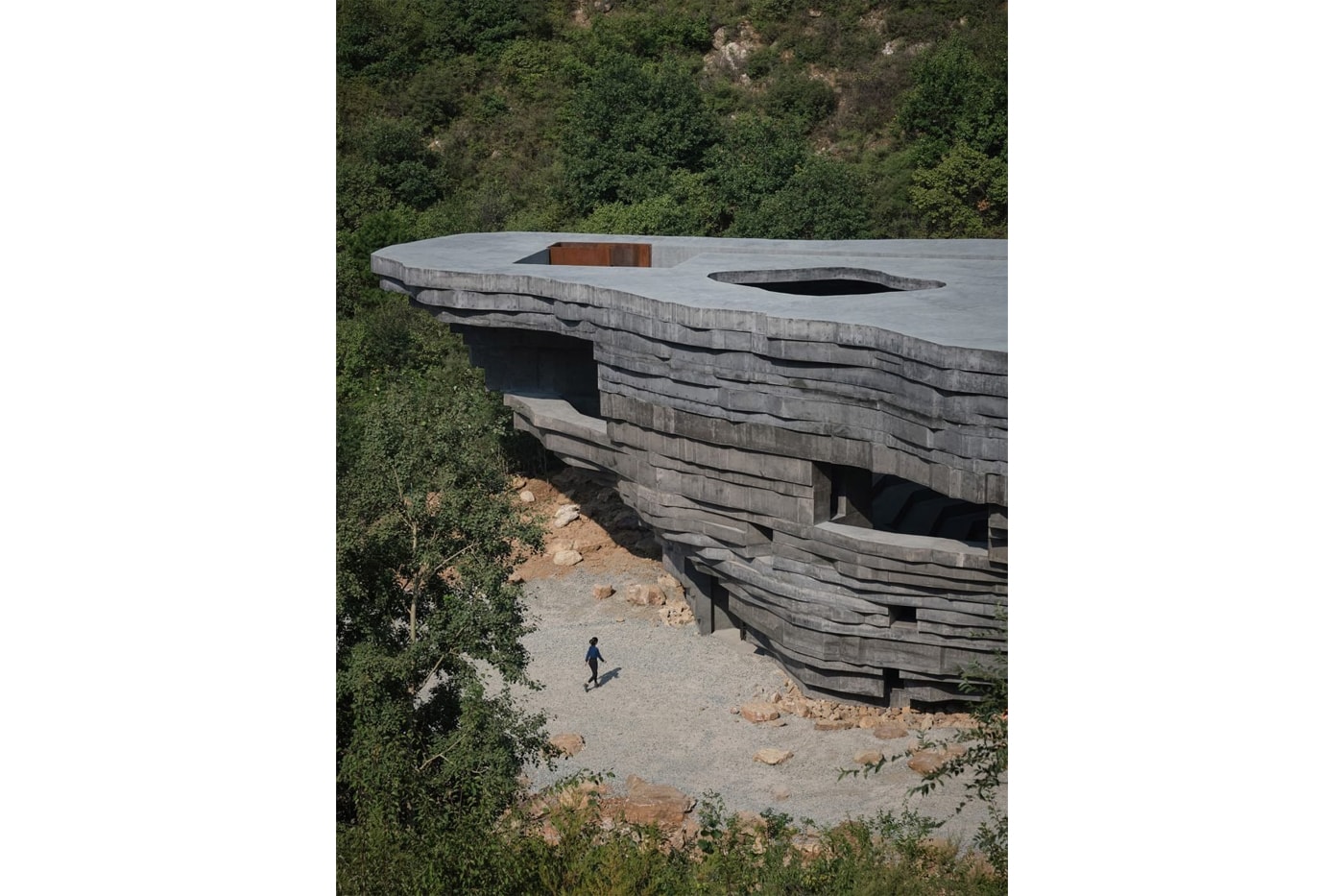 Open Architecture Completes "The Chapel of Sound" Rock-Like Concert Hall mountainous valley great wall of china concrete natural local stone reflection amphitheater stage beijing Li Hu Huang wenjiang news