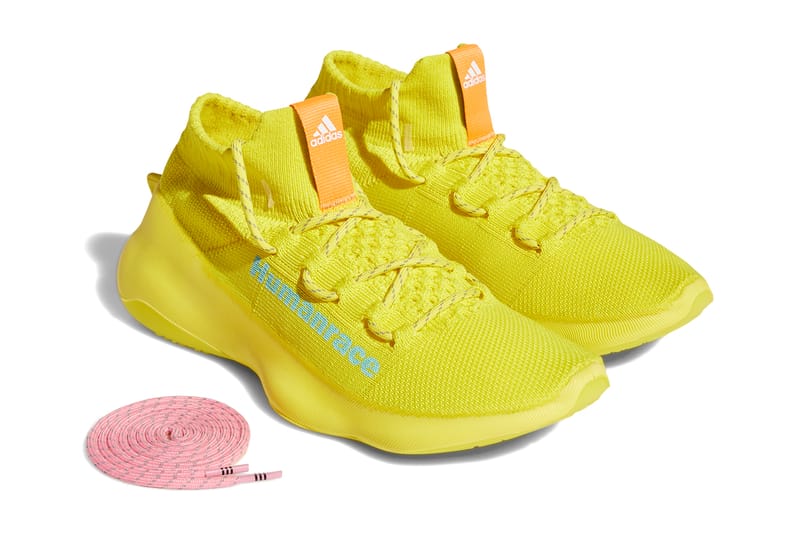 adidas yellow human race shoes