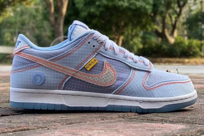 Take a First Look at the Union x Nike Dunk Low light blue lilac grid texture white the frontman Los angeles LA yellow tag 2022 release info date