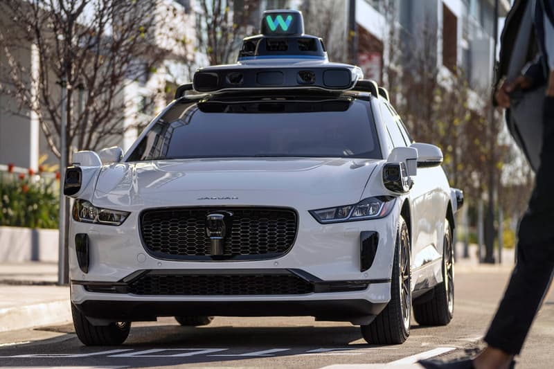 waymo driver new york city streets dense urban heavy rain dense snowfall manhattan central park new jersey financial district  hybrid chrysler pacificajaguar i-pace