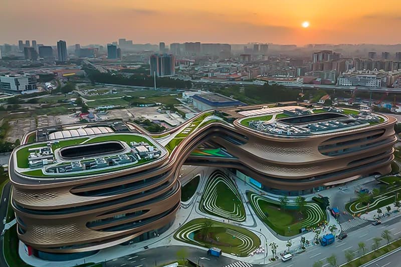 zaha hadid architects fluid infinitus plaza infinity symbol china workspaces herbal medicine research labs ineteraction central LEED gold recyclable solar reduction