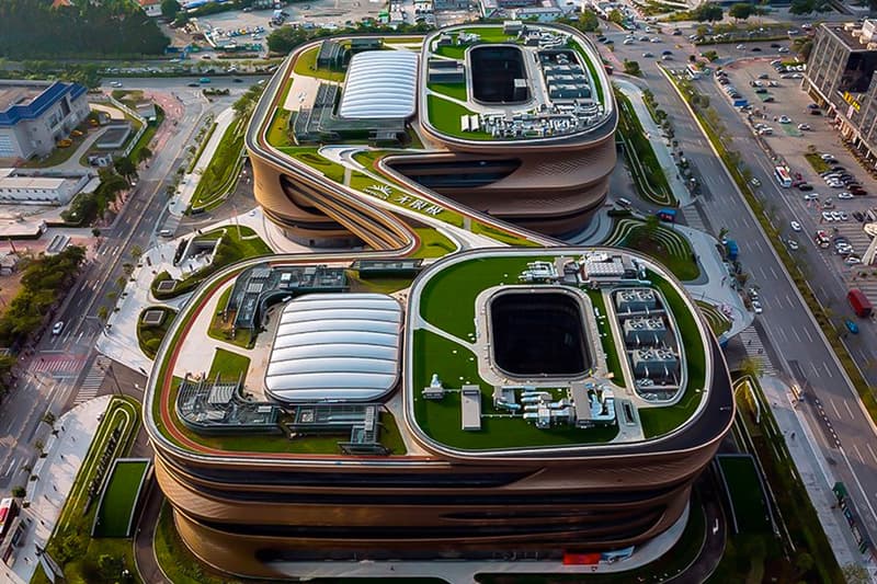 zaha hadid architects fluid infinitus plaza infinity symbol china workspaces herbal medicine research labs ineteraction central LEED gold recyclable solar reduction
