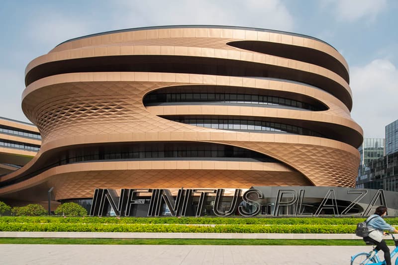 zaha hadid architects fluid infinitus plaza infinity symbol china workspaces herbal medicine research labs ineteraction central LEED gold recyclable solar reduction