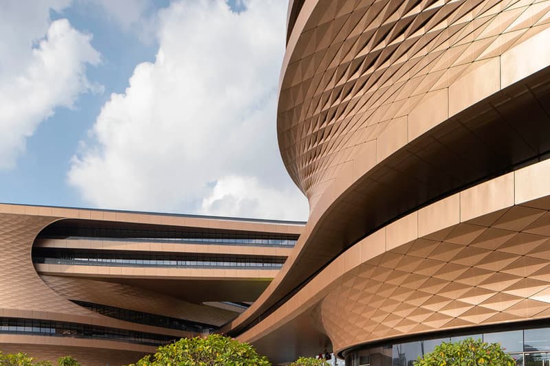 zaha hadid architects fluid infinitus plaza infinity symbol china workspaces herbal medicine research labs ineteraction central LEED gold recyclable solar reduction