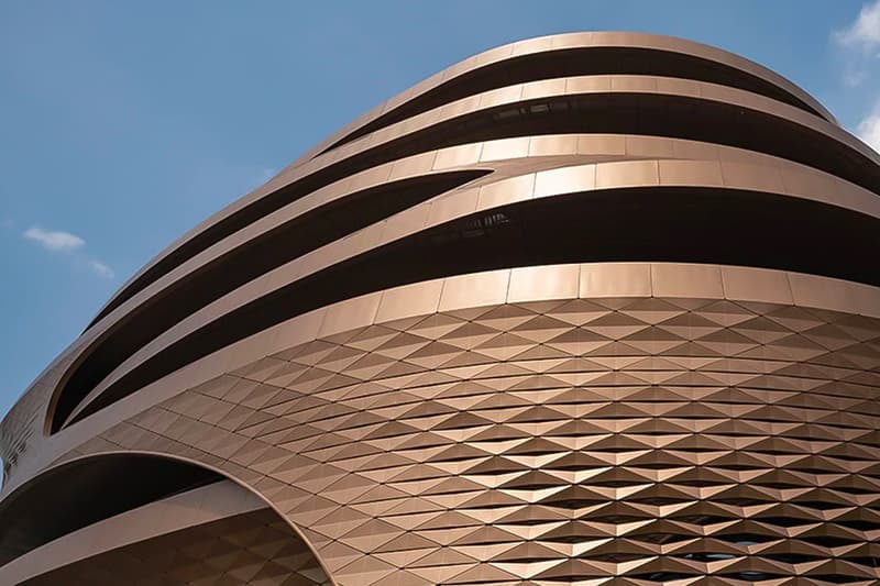 zaha hadid architects fluid infinitus plaza infinity symbol china workspaces herbal medicine research labs ineteraction central LEED gold recyclable solar reduction