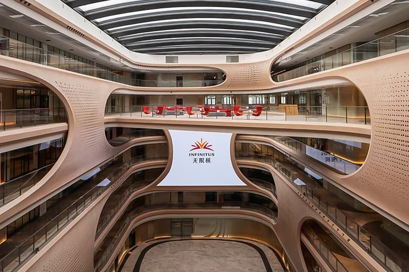 zaha hadid architects fluid infinitus plaza infinity symbol china workspaces herbal medicine research labs ineteraction central LEED gold recyclable solar reduction