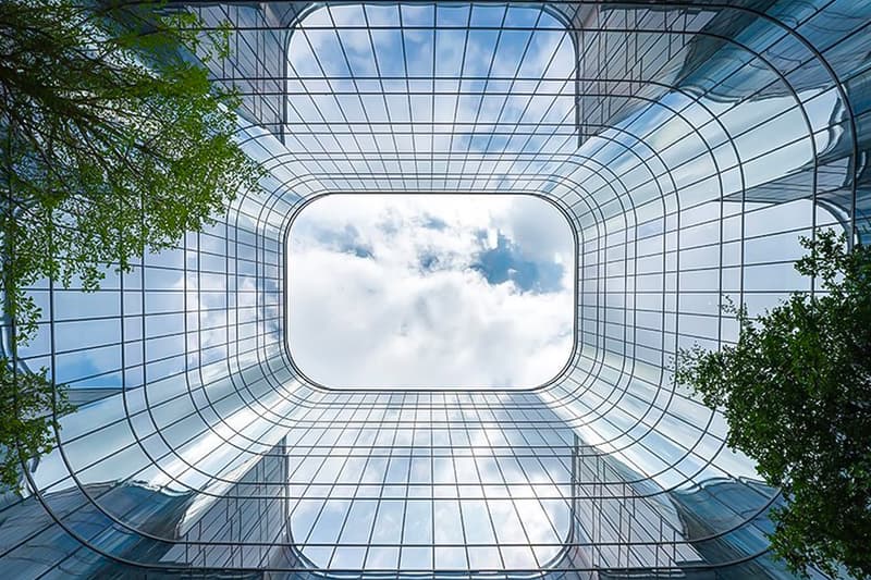 zaha hadid architects fluid infinitus plaza infinity symbol china workspaces herbal medicine research labs ineteraction central LEED gold recyclable solar reduction