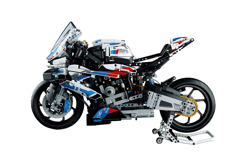 Lego develops bmw M 1000 RR motorsport motorcycle technic 3 speed gearbox steering suspension chain transmission engine 2 display stands 18 plus adult set blue white red release info