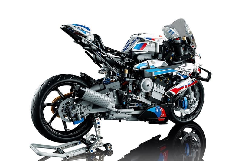 Lego develops bmw M 1000 RR motorsport motorcycle technic 3 speed gearbox steering suspension chain transmission engine 2 display stands 18 plus adult set blue white red release info