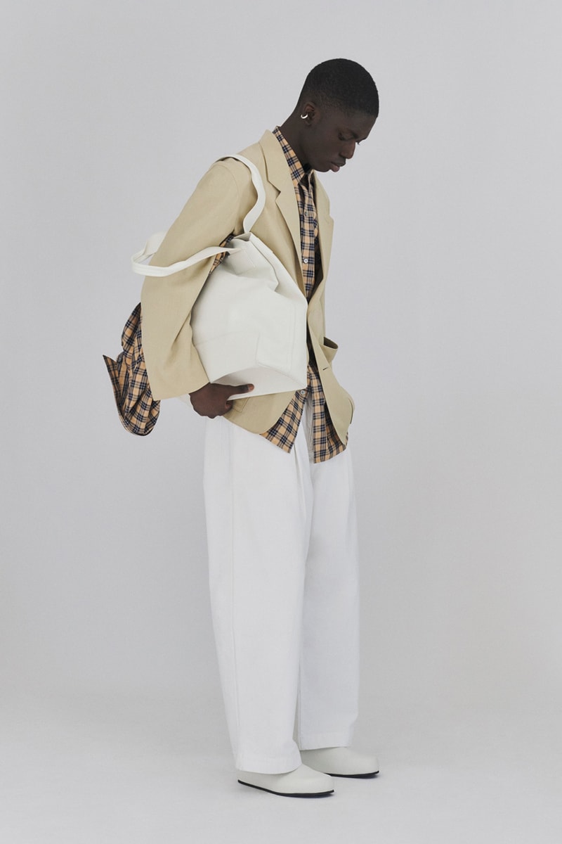Studio Nicholson’s SS22 Collection Offers a Modern Take on Ivy League Americana Fashion