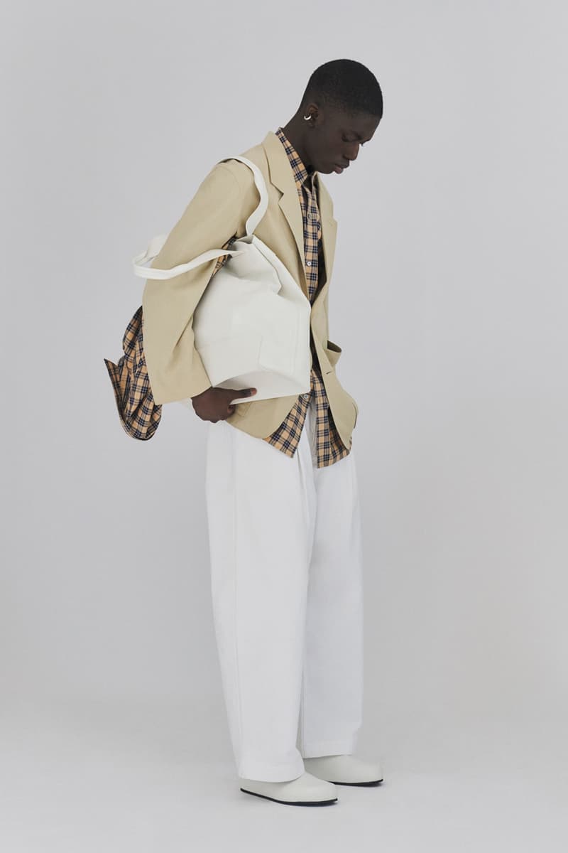 Studio Nicholson’s SS22 Collection Offers a Modern Take on Ivy League Americana Fashion
