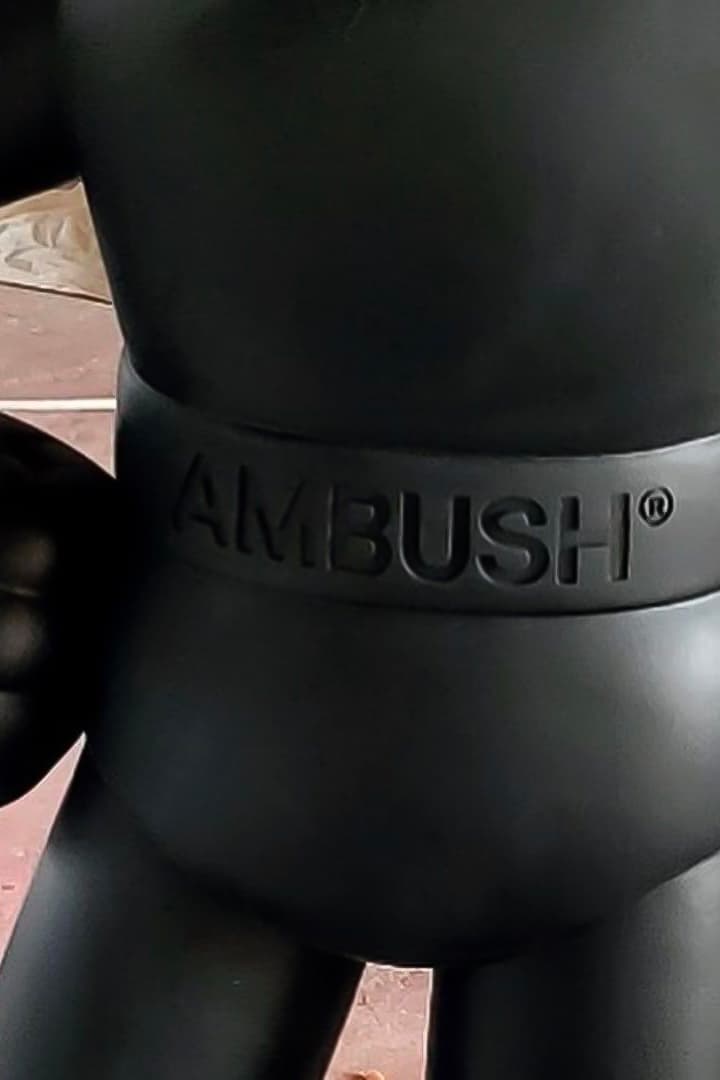 YOON First Look AMBUSH Astro Boy Figure jumpsuit silver metallic open heart black circuitry release info