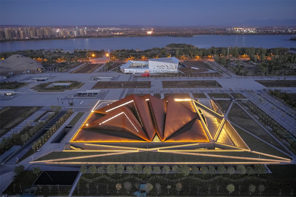 Datong Art Museum Arrives Under Four Interconnected Pyramids luke fox skylight corroded earth toned steel northwest grand gallery images news