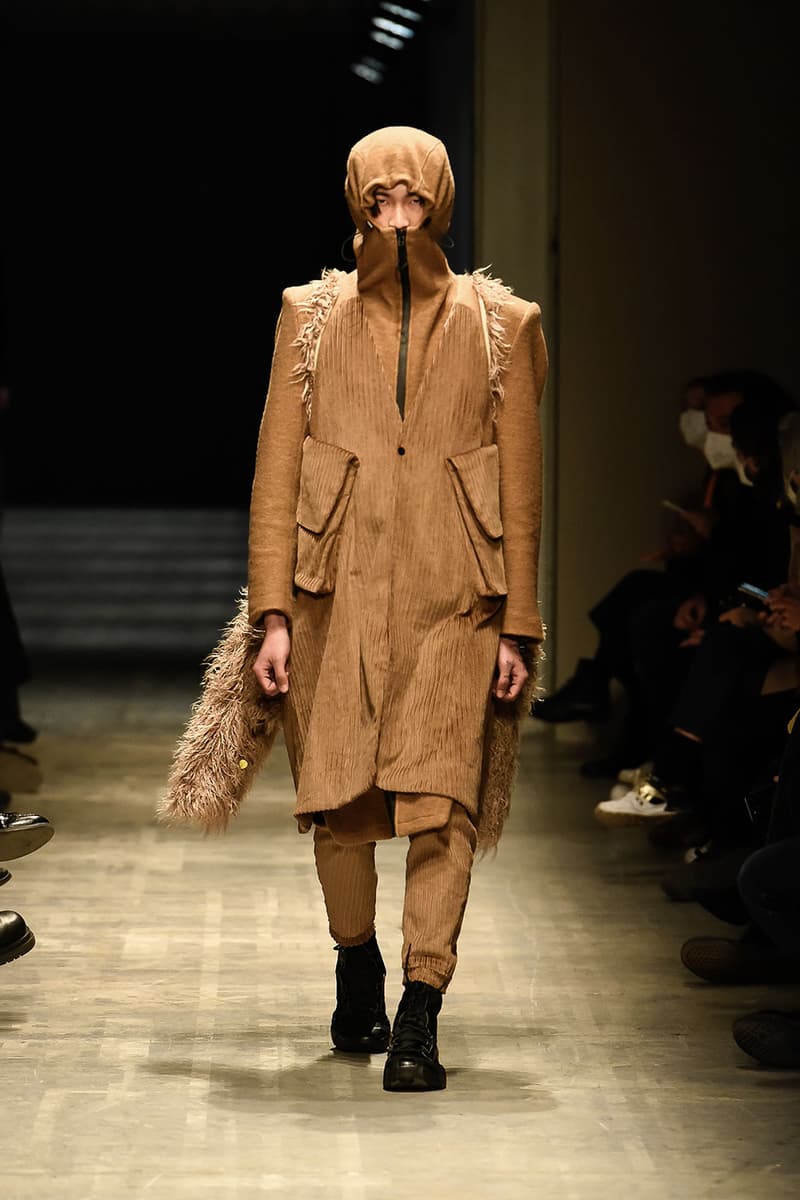 GALL FW22 Is Where Tailoring Meets Volume milan fashion week runway models justin gall murk earthy tones geometric pattern volume high fashion technical effortless