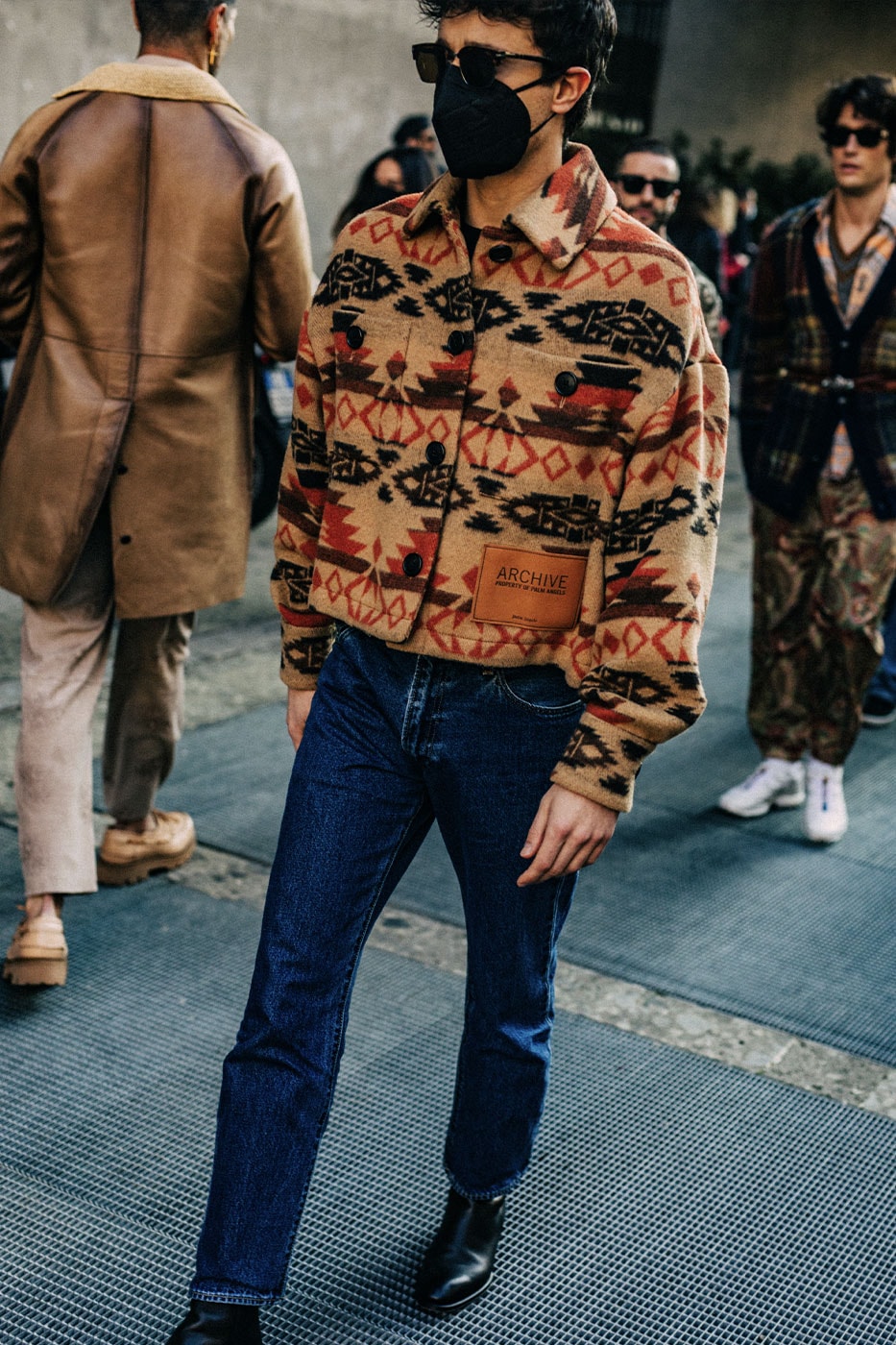 Milan Men's Fashion Week FW22 Street Style Served Coziness in Standout Patterns and Baggy Silhouettes fendi prada comme des garcons jw anderson