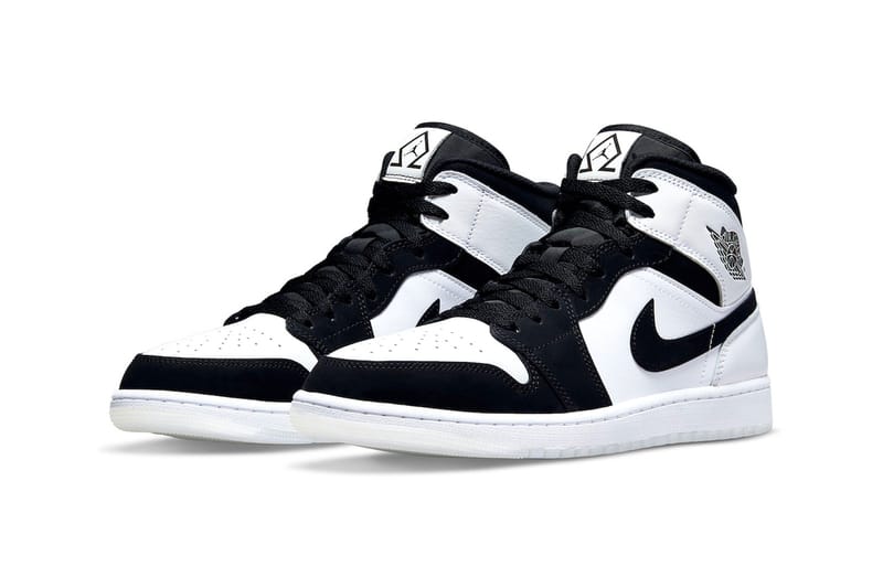 black and white jordans mids