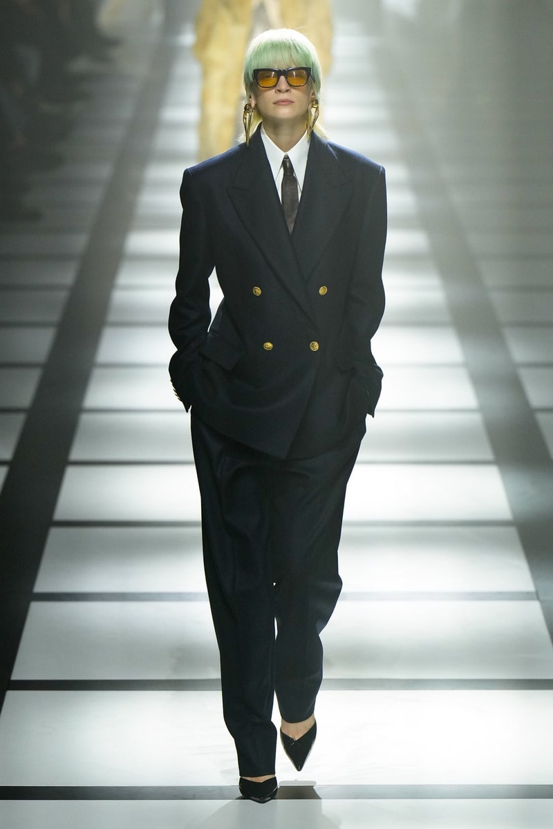 Gucci x adidas Unveils Fall 2022 Collection Blazers Jackets Pants Knitwear Latex Trefoil Three Strips Midi Dresses Leather Skirts Corduroy Chiffon Sportswear German Label Luxury Fashion Lookbook Plaid Monogram Pinstripe Patterns Peak Wide Lapel Hats Accessories Blue Yellow  