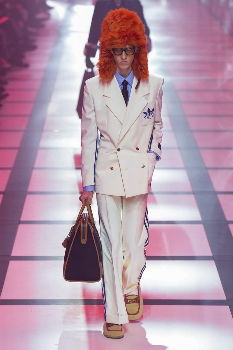 Gucci x adidas Unveils Fall 2022 Collection Blazers Jackets Pants Knitwear Latex Trefoil Three Strips Midi Dresses Leather Skirts Corduroy Chiffon Sportswear German Label Luxury Fashion Lookbook Plaid Monogram Pinstripe Patterns Peak Wide Lapel Hats Accessories Blue Yellow  