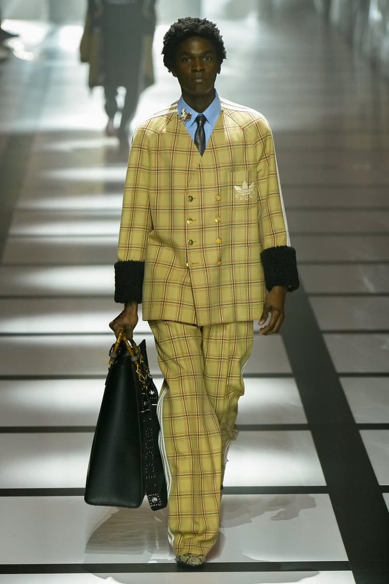 Gucci x adidas Unveils Fall 2022 Collection Blazers Jackets Pants Knitwear Latex Trefoil Three Strips Midi Dresses Leather Skirts Corduroy Chiffon Sportswear German Label Luxury Fashion Lookbook Plaid Monogram Pinstripe Patterns Peak Wide Lapel Hats Accessories Blue Yellow  