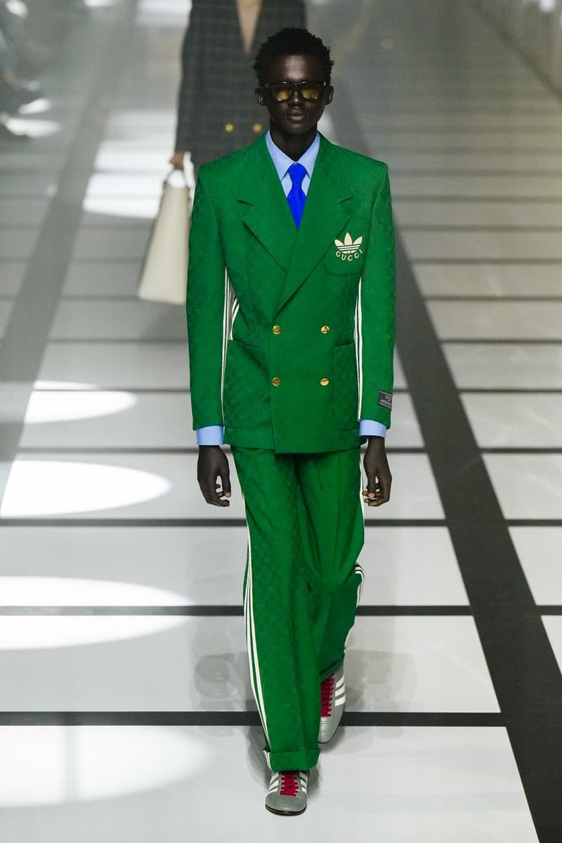 Gucci x adidas Unveils Fall 2022 Collection Blazers Jackets Pants Knitwear Latex Trefoil Three Strips Midi Dresses Leather Skirts Corduroy Chiffon Sportswear German Label Luxury Fashion Lookbook Plaid Monogram Pinstripe Patterns Peak Wide Lapel Hats Accessories Blue Yellow  