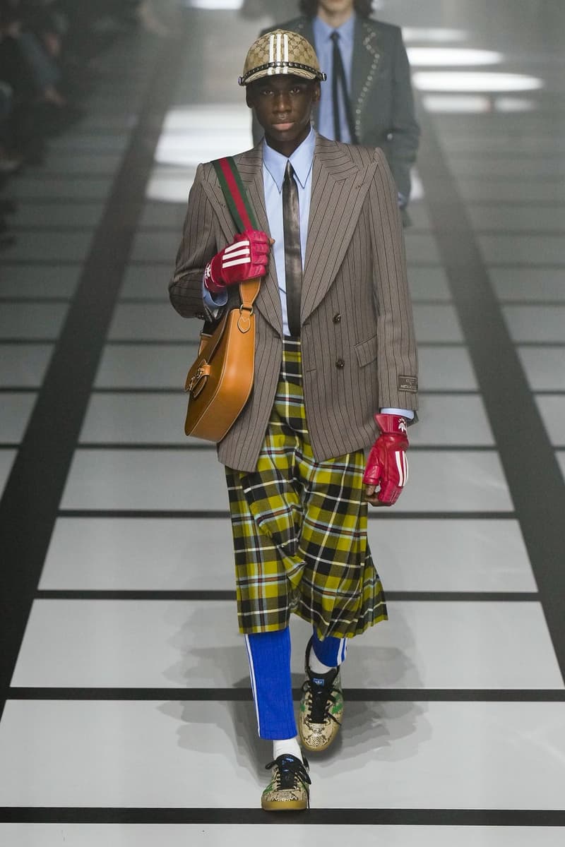 Gucci x adidas Unveils Fall 2022 Collection Blazers Jackets Pants Knitwear Latex Trefoil Three Strips Midi Dresses Leather Skirts Corduroy Chiffon Sportswear German Label Luxury Fashion Lookbook Plaid Monogram Pinstripe Patterns Peak Wide Lapel Hats Accessories Blue Yellow  