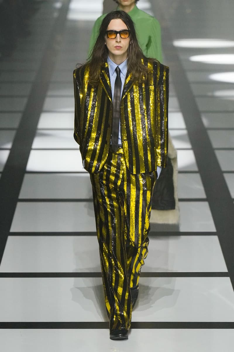 Gucci x adidas Unveils Fall 2022 Collection Blazers Jackets Pants Knitwear Latex Trefoil Three Strips Midi Dresses Leather Skirts Corduroy Chiffon Sportswear German Label Luxury Fashion Lookbook Plaid Monogram Pinstripe Patterns Peak Wide Lapel Hats Accessories Blue Yellow  