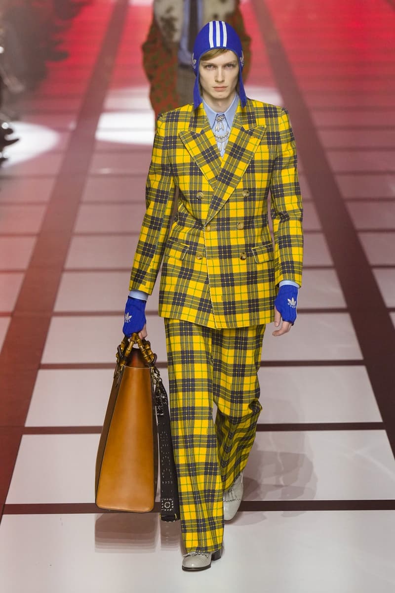 Gucci x adidas Unveils Fall 2022 Collection Blazers Jackets Pants Knitwear Latex Trefoil Three Strips Midi Dresses Leather Skirts Corduroy Chiffon Sportswear German Label Luxury Fashion Lookbook Plaid Monogram Pinstripe Patterns Peak Wide Lapel Hats Accessories Blue Yellow  