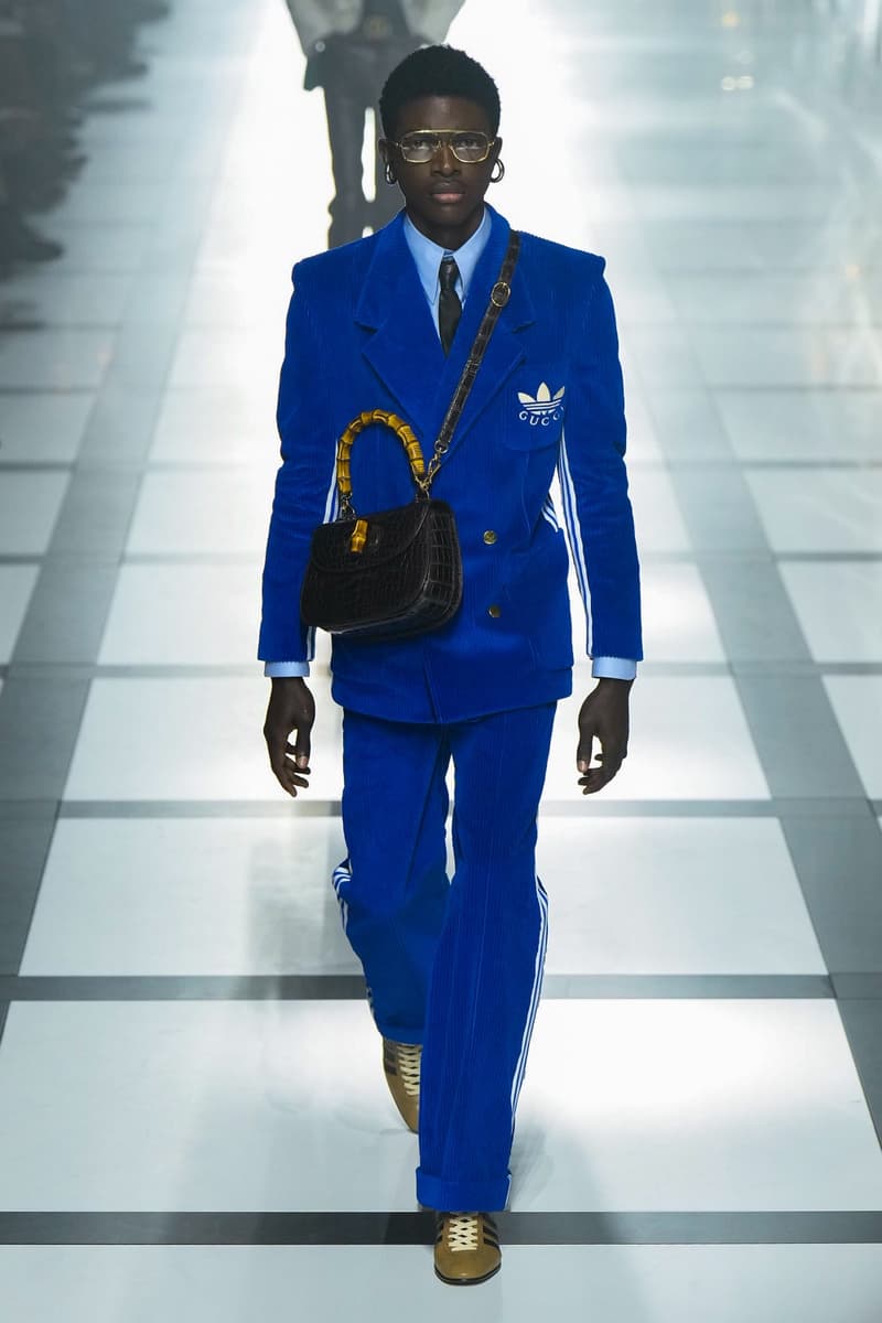 Gucci x adidas Unveils Fall 2022 Collection Blazers Jackets Pants Knitwear Latex Trefoil Three Strips Midi Dresses Leather Skirts Corduroy Chiffon Sportswear German Label Luxury Fashion Lookbook Plaid Monogram Pinstripe Patterns Peak Wide Lapel Hats Accessories Blue Yellow  