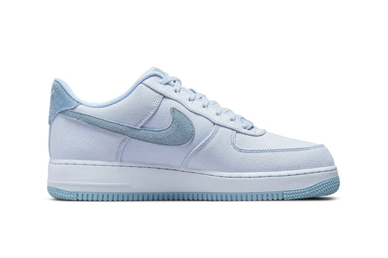 air force 1 with light blue nike sign